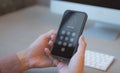 Device secure access concept, Businessman accessing smartphone with pin code. cyber security, hacking phishing, Mobile phone