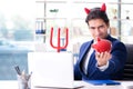 The devil angry businessman in the office Royalty Free Stock Photo