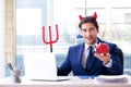 The devil angry businessman in the office Royalty Free Stock Photo