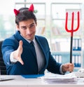Devil angry businessman in the office Royalty Free Stock Photo
