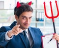 Devil angry businessman in the office Royalty Free Stock Photo