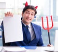 Devil angry businessman in the office Royalty Free Stock Photo
