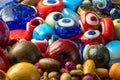 Devil eyes and colorful beads Royalty Free Stock Photo