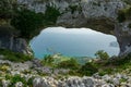 Devil eyes hole to the cantabrian sea in Cantabria, Spain Royalty Free Stock Photo