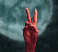 Devil hand with peace hand sign Royalty Free Stock Photo