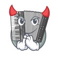 Devil miniature accrodion in the shape mascot