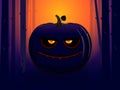 Devil pumpkin at sunset on Halloween Royalty Free Stock Photo