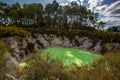 Devil`s Bath green pond at Wai-O-Tapu, Rotorua, North Island, New Zealand Royalty Free Stock Photo