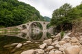 Devil's Bridge - an ancient stone bridge in Bulgaria, Europe Royalty Free Stock Photo