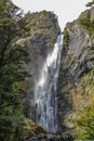 Devil`s Punchbowl Waterfall in Arthur`s Pass National Park, New Zealand Royalty Free Stock Photo