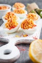 Deviled eggs appetizer with hummus. green asparagus Royalty Free Stock Photo