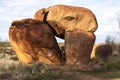 Devils Marbles are huge granite boulders scattered across a wide, shallow valley, 100 kilometers south of Tennant Creek Royalty Free Stock Photo