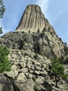 Devils Tower with Rocky Foundation In Bright Day In Northeast Wyoming