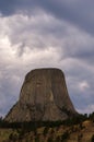 Devils Tower with stormy clouds above Royalty Free Stock Photo