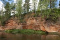 Devonian rock on the Oredezh river in June afternoon. Siversky Royalty Free Stock Photo