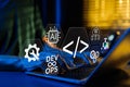 DevOps and AI integration in software development process concept. Developer working on laptop with digital coding icons, Royalty Free Stock Photo
