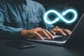 DevOps engineer in agile environment. infinity icon on computer