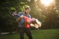 Devoted father spinning his daughter in circles