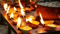 Devotee lighting up candles