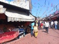 souvenir shopping in local market outside Bahu Fort, Bawe Wali Mata temple in Jammu Royalty Free Stock Photo