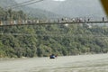 Devotees crossing river Ganga by Hanging bridge