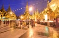 Devotees at Crowded & brightly lit Shwedagon Pagoda in the evening during sunset Royalty Free Stock Photo