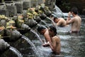 Men Ritual Bathing at Puru Tirtha Empul, Bali Royalty Free Stock Photo