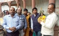 Devotees with Lord Krishna Idol