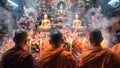 Devotees in meditation at temple interior. Worshipers in traditional attire engage in prayer before Buddha. Buddhist
