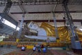 Devotees praying at Shwethalyaung Buddha, Bago, Myanmar Royalty Free Stock Photo