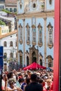 Devotees of Santa Barbara attend mass in front of Rosario dos Pretos church