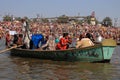 Devotees travel in boat to take bath during the Kumbh Mela