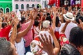 Devout Catholics of Santa Barbara raise their arms to the sky in Royalty Free Stock Photo