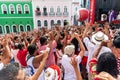 Devout Catholics of Santa Barbara raise their arms to the sky in Royalty Free Stock Photo