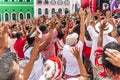 Devout Catholics of Santa Barbara raise their arms to the sky in Royalty Free Stock Photo