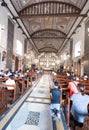 Devout Filipino worshipers of all ages, gather for worship,inside the iconic Basilica of Saint Nino,Cebu\'s oldest church