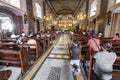 Devout Filipino worshipers of all ages, gather for worship,inside the iconic Basilica of Saint Nino,Cebu\'s oldest church