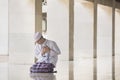 Devout Muslim man looks sad in the mosque Royalty Free Stock Photo