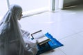 Devout woman reading Quran after doing Salat Royalty Free Stock Photo