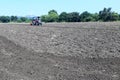 22-10-2021, Dewas, M.P. India. Plowing the field with a tractor, farmers preparing the field before sowing the crop, a new