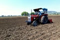 22-10-2021, Dewas, M.P. India. Plowing the field with a tractor, farmers preparing the field before sowing the crop, a new