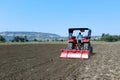 22-10-2021, Dewas, M.P. India. Plowing the field with a tractor, farmers preparing the field before sowing the crop, a new