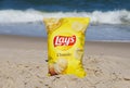 Dewey Beach, Delaware, U.S - August 13, 2022 - A bag of Lay\'s potato chips on the beach