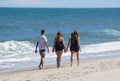 Dewey Beach, Delaware, U.S - August 13, 2022 - A group of teenagers walking on the beach