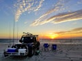 Dewey Beach, Delaware, U.S - September 5, 2020 - A black Jeep equipped with fishing items during early morning sunrise