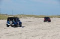 Dewey Beach, Delaware, U.S - September 3, 2022 - Two Jeep Wrangler driving on the beach