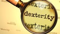 Dexterity and a magnifying glass on English word Dexterity to symbolize studying, examining or searching for an explanation and