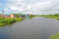 The Deyma River with houses ashore. Polessk, Kaliningrad region Royalty Free Stock Photo