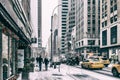 31 DEZ 2017 - NEW YORK/USA - People walking on the streets of New York to snow. Royalty Free Stock Photo
