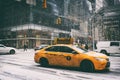 31 DEZ 2017 - NEW YORK/USA - Taxi on the streets of New York with snow. Royalty Free Stock Photo